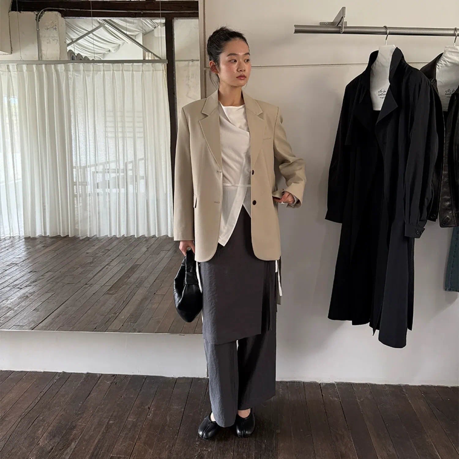 “Osaka” layered wrap pants with side tie detail, minimalist Japandi-inspired design, wide-leg silhouette, product by Sumoka Studio.