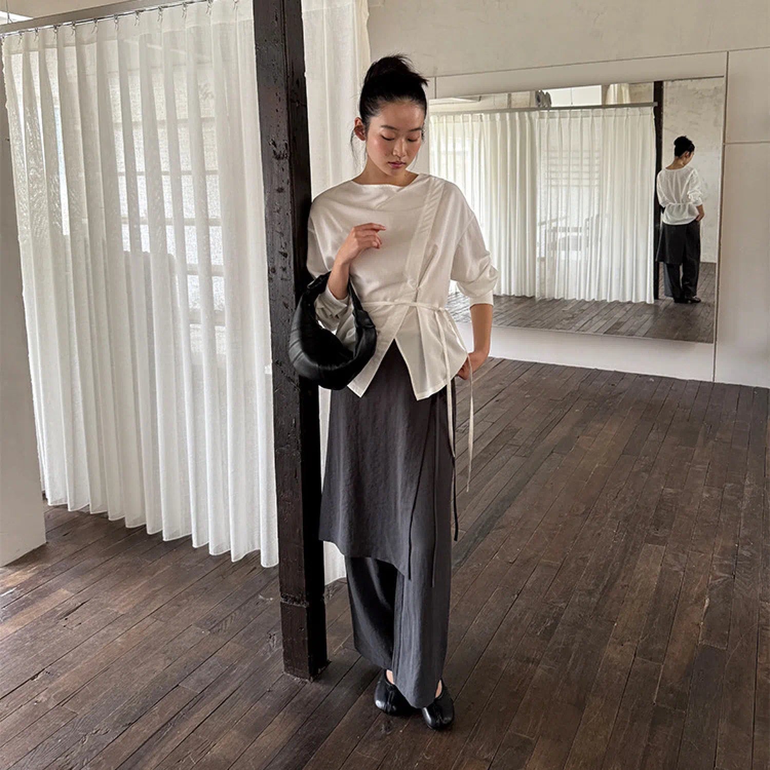 “Osaka” layered wrap pants with side tie detail, minimalist Japandi-inspired design, wide-leg silhouette, product by Sumoka Studio.