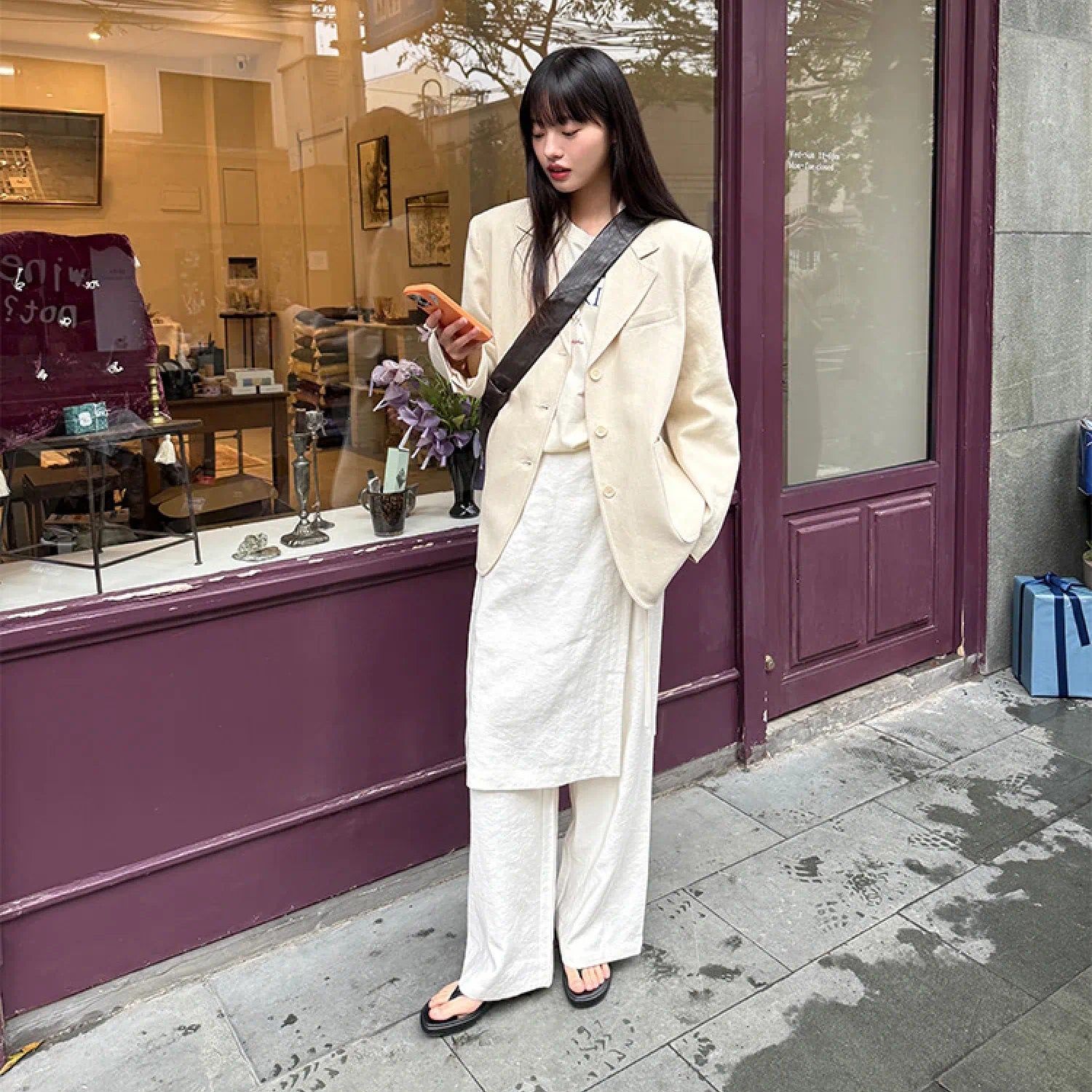 “Osaka” layered wrap pants with side tie detail, minimalist Japandi-inspired design, wide-leg silhouette, product by Sumoka Studio.