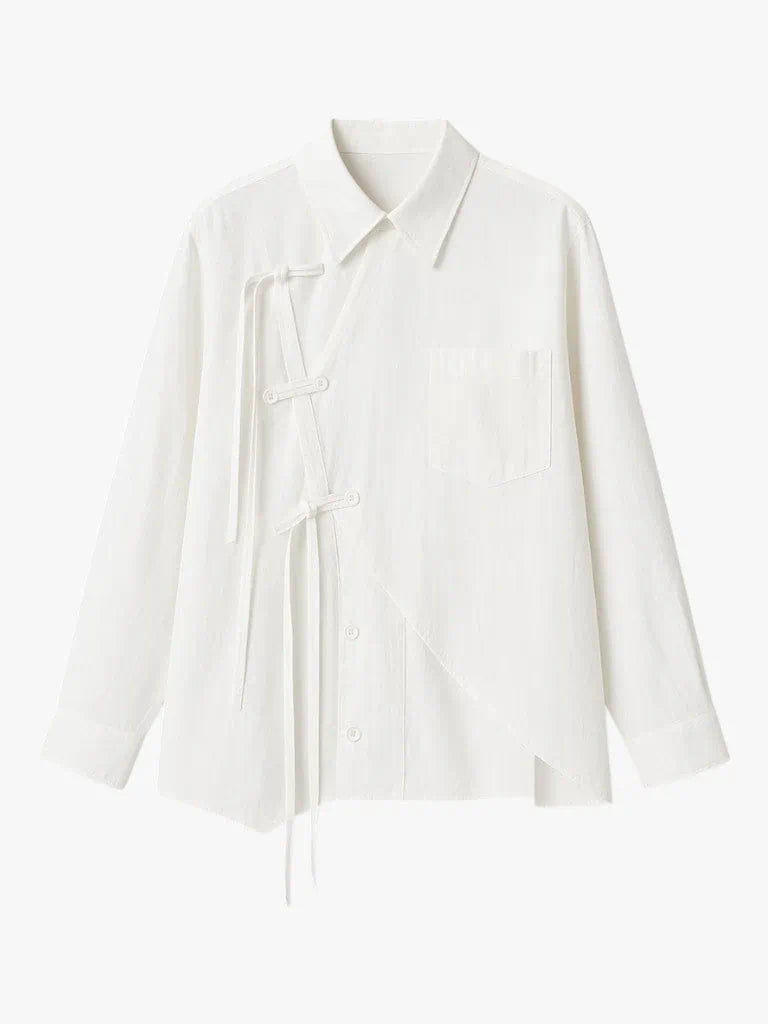 “Hikari” white asymmetric wrap shirt with side ties, minimalist Japandi-inspired design, loose fit, product by Sumoka Studio.